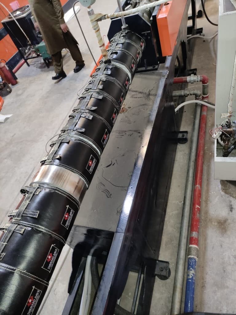 Close-up of ThermoSave insulation jackets on Al-Khair extruder